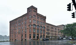 This new $67 million seven-story mixed-use building nearby at 150 River St. is part of the redeveloped John P. Taylor Apartments, a public housing complex.