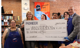 Pioneer President & CEO Tom Amell and Karen Carpenter, President and CEO of Vanderheyden at the $10,000 check presentation