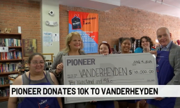 Pioneer & President Tom Amell presents $10,000 check donation to Vanderheyden President and CEO Karen Carpenter